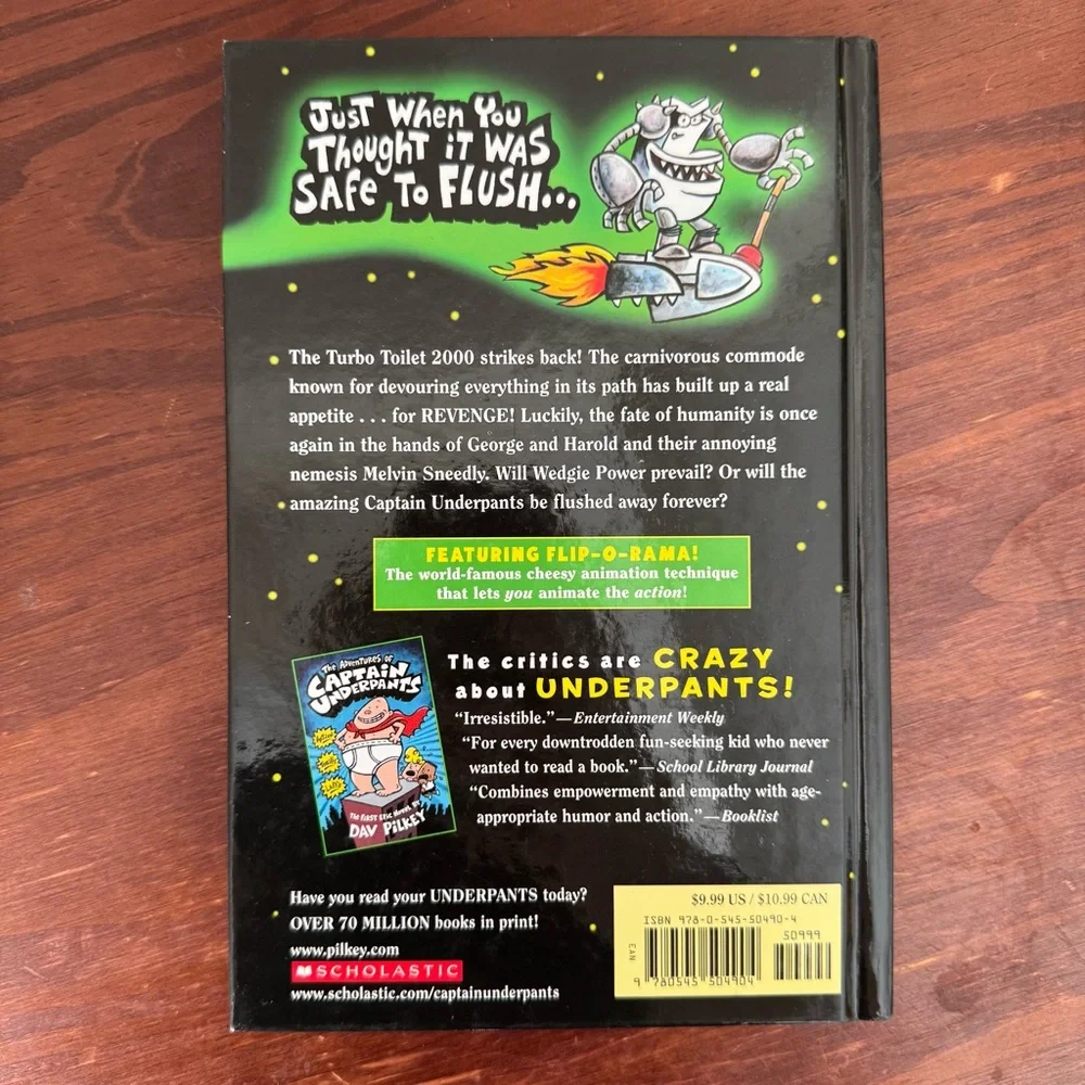 2 Captain Underpants hardcover books by Dav Pilkey. Tyrannical Revolting Revenge